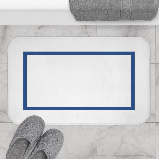 Luxurious white bath mat with blue rectangle