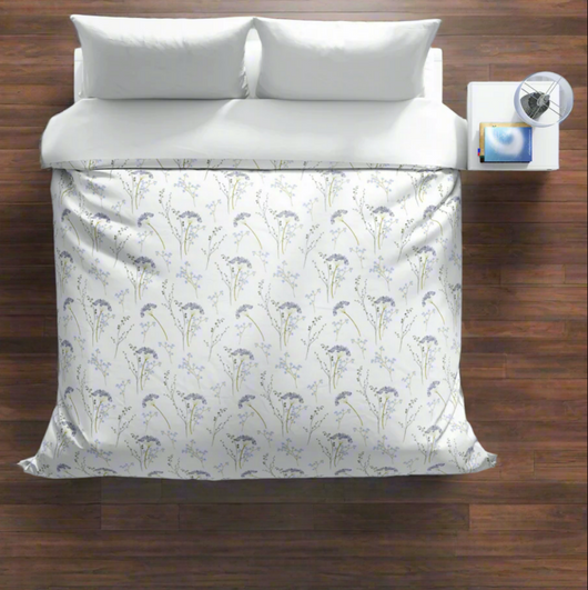 duvet-cover-with-blue-floral-pattern-on-wooden-floor