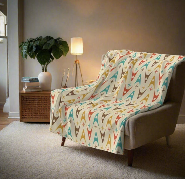 colorful mid century fleece throw blanket on a chair