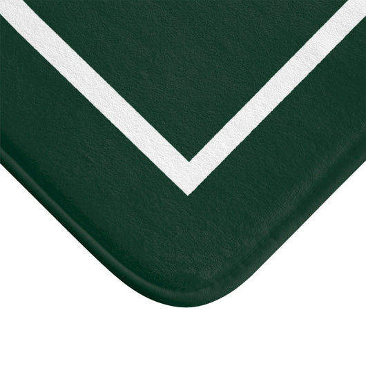 close up of dark green bath mat