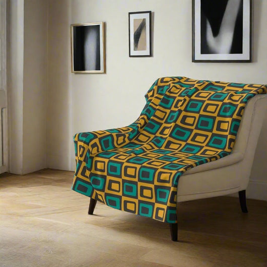 Gold and Teal 50s mid century Fleece Blanket in a stylish room